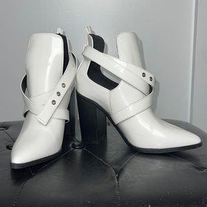 Ankle boots in white with black heal.  Size 8.